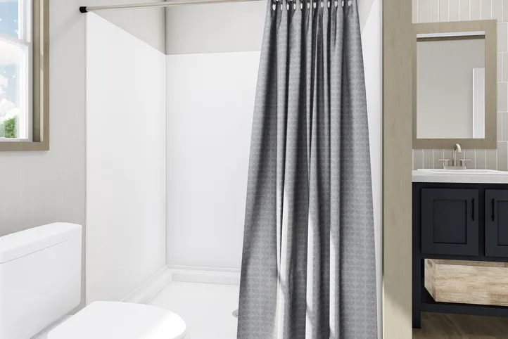 The COOK Primary Bathroom. This Manufactured Mobile Home features 3 bedrooms and 2 baths.