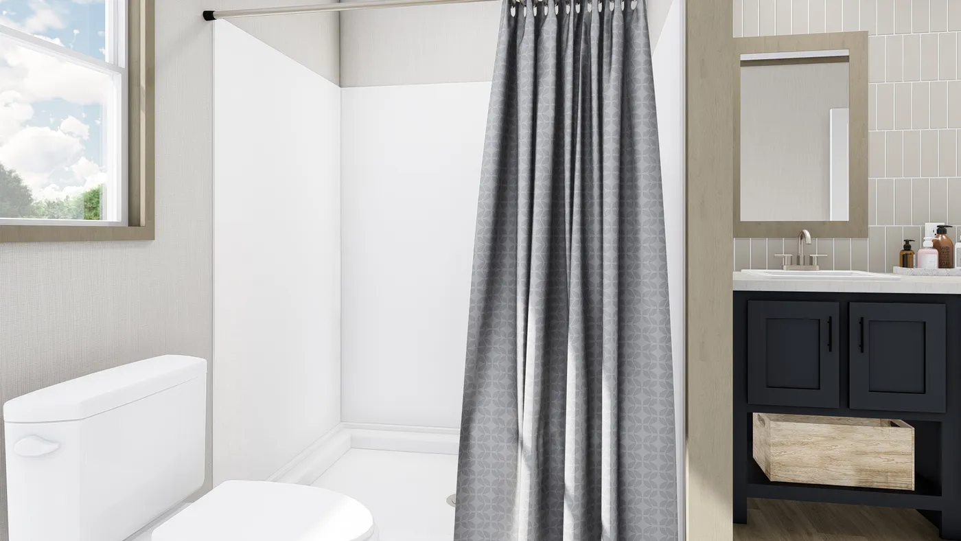 The COOK Primary Bathroom. This Manufactured Mobile Home features 3 bedrooms and 2 baths.