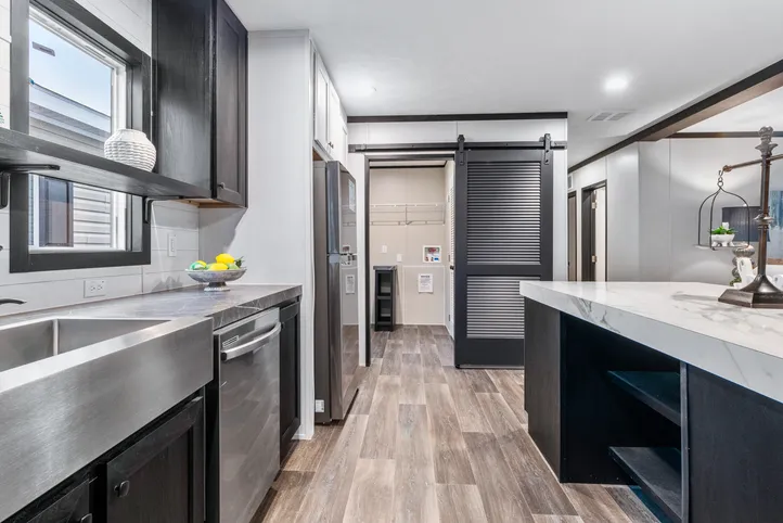 The THE RENEGADE Kitchen. This Manufactured Mobile Home features 3 bedrooms and 2 baths.