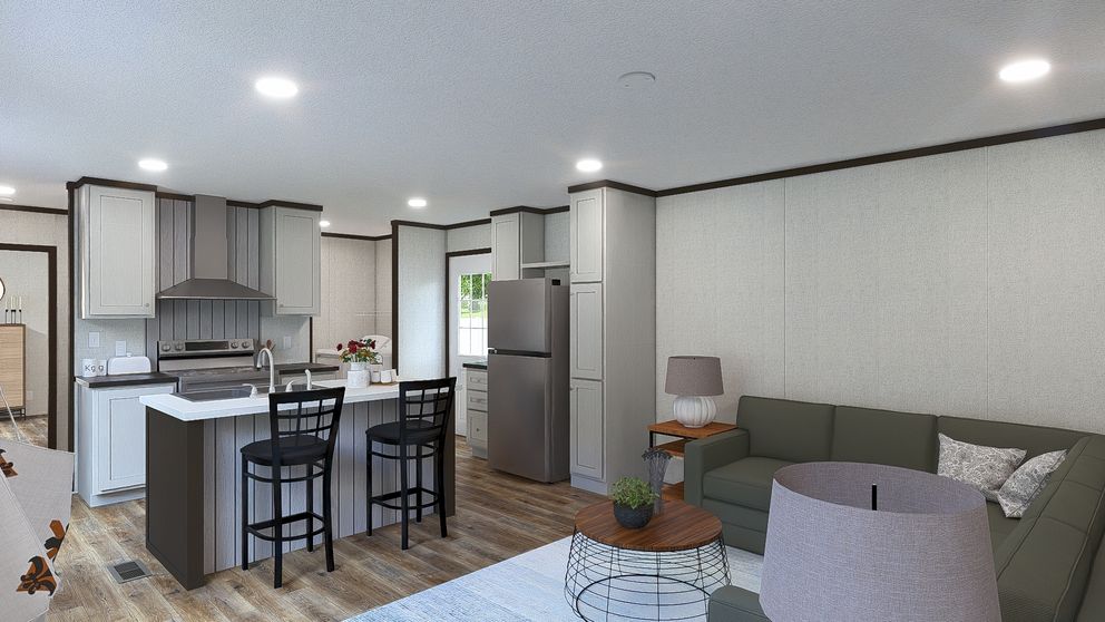 The SPIRIT Living Room. This Manufactured Mobile Home features 2 bedrooms and 2 baths.