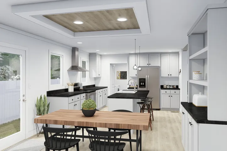 The CLASSIC 56D Dining Area. This Manufactured Mobile Home features 3 bedrooms and 2 baths.