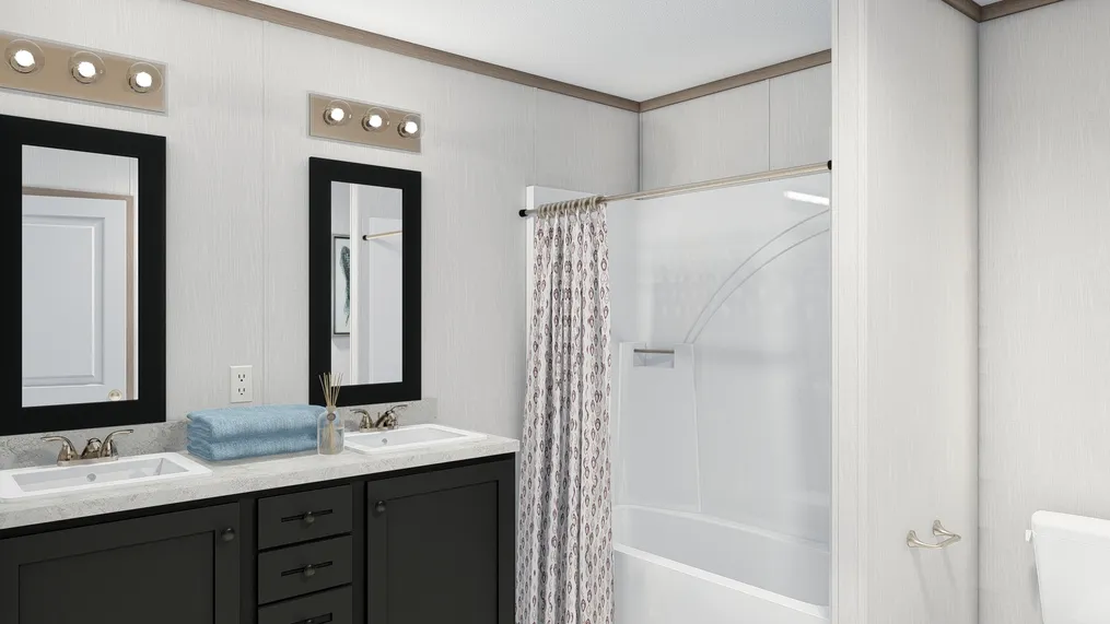 The 7616-4710 THE PULSE Primary Bathroom. This Manufactured Mobile Home features 3 bedrooms and 2 baths.