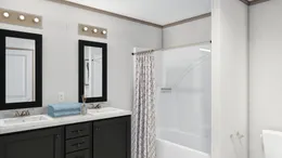 The 7616-4710 THE PULSE Primary Bathroom. This Manufactured Mobile Home features 3 bedrooms and 2 baths.