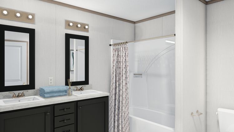 The 7616-4710 THE PULSE Primary Bathroom. This Manufactured Mobile Home features 3 bedrooms and 2 baths.