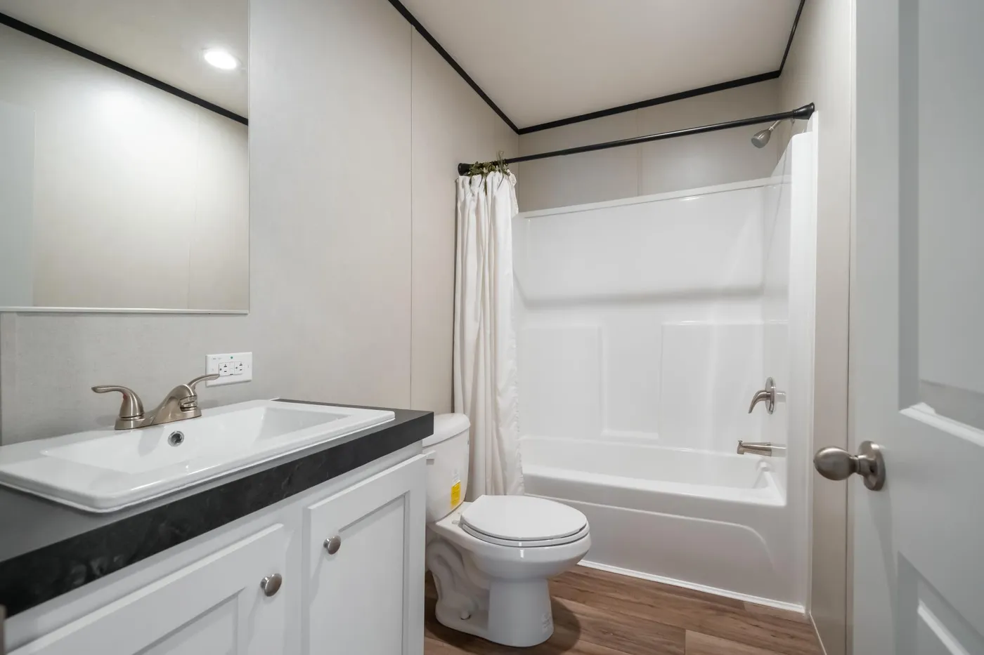 The ELEMENT Guest Bathroom. This Manufactured Mobile Home features 3 bedrooms and 2 baths.