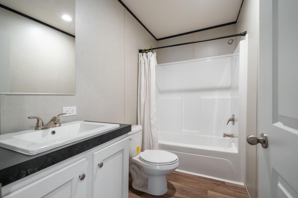 The ELEMENT Guest Bathroom. This Manufactured Mobile Home features 3 bedrooms and 2 baths.