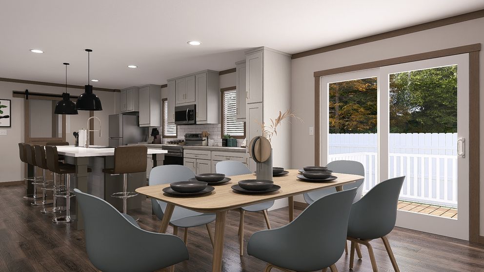 The ISABELLA ELITE Dining Area. This Manufactured Mobile Home features 3 bedrooms and 2 baths.