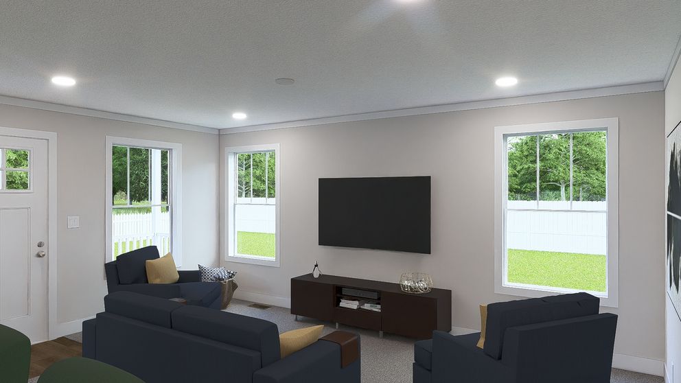 The WHOLE LOTTA LOVE Living Room. This Manufactured Mobile Home features 3 bedrooms and 2 baths.