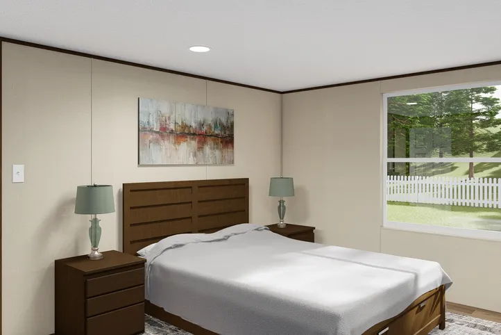 The DELIGHT Primary Bedroom. This Manufactured Mobile Home features 2 bedrooms and 2 baths.