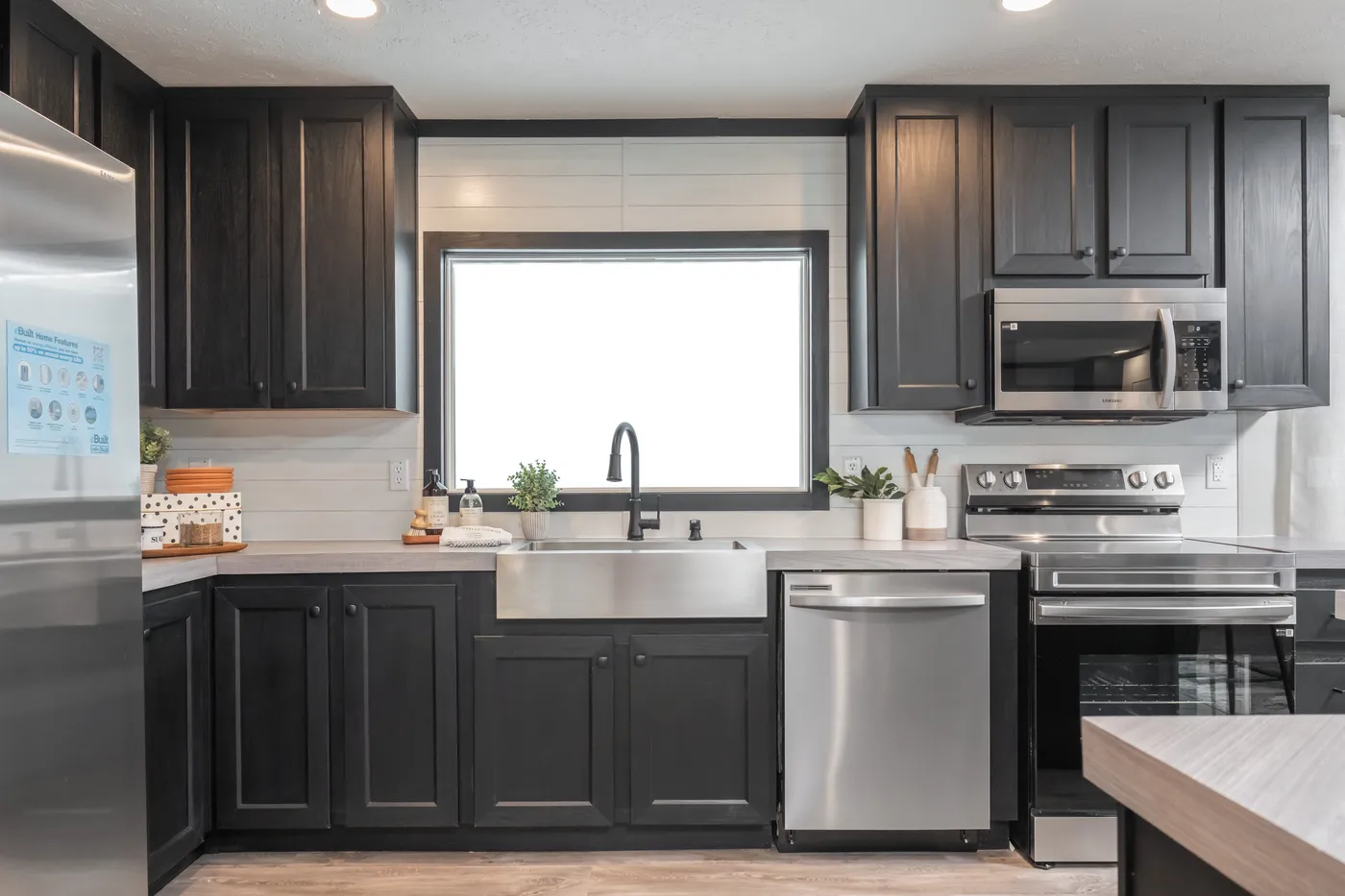 The CRAZY EIGHTS Kitchen. This Manufactured Mobile Home features 4 bedrooms and 2 baths.