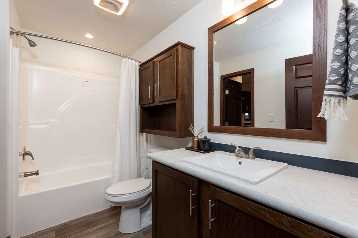 The LEGEND 86 Primary Bathroom. This Manufactured Mobile Home features 3 bedrooms and 2 baths.