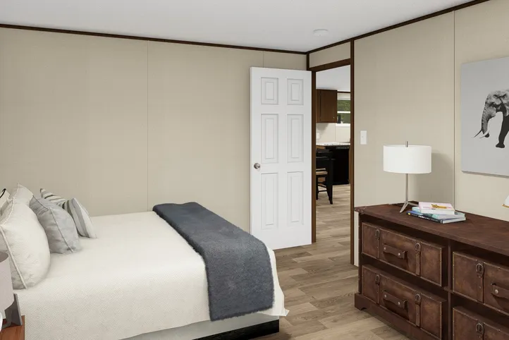 The SATISFACTION Bedroom. This Manufactured Mobile Home features 3 bedrooms and 2 baths.
