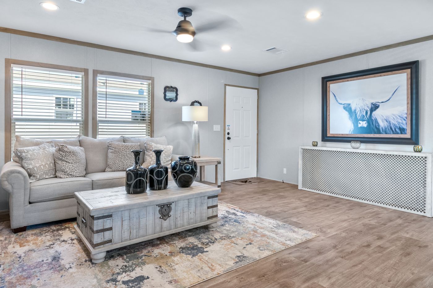 The PT 78 Living Room. This Manufactured Mobile Home features 3 bedrooms and 2 baths.