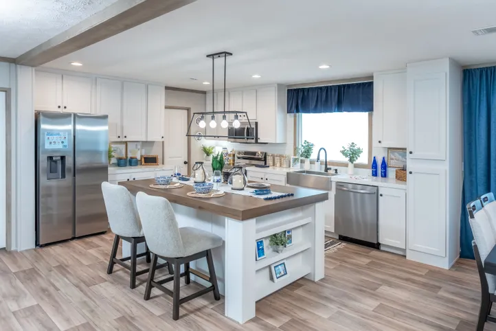 The EL SUENO BREEZE Kitchen. This Manufactured Mobile Home features 4 bedrooms and 2 baths.