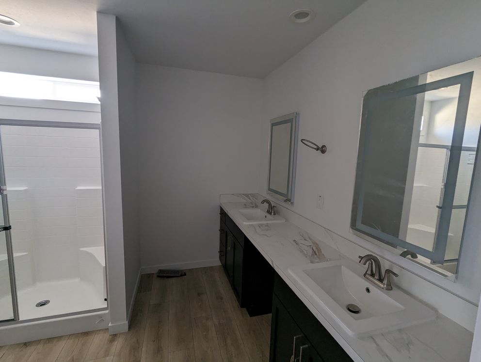 The SUNRISE 68 Primary Bathroom. This Manufactured Mobile Home features 2 bedrooms and 2 baths.