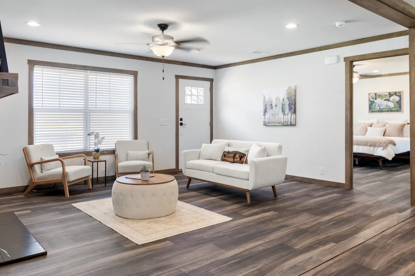 The ISABELLA ELITE Living Room. This Manufactured Mobile Home features 3 bedrooms and 2 baths.