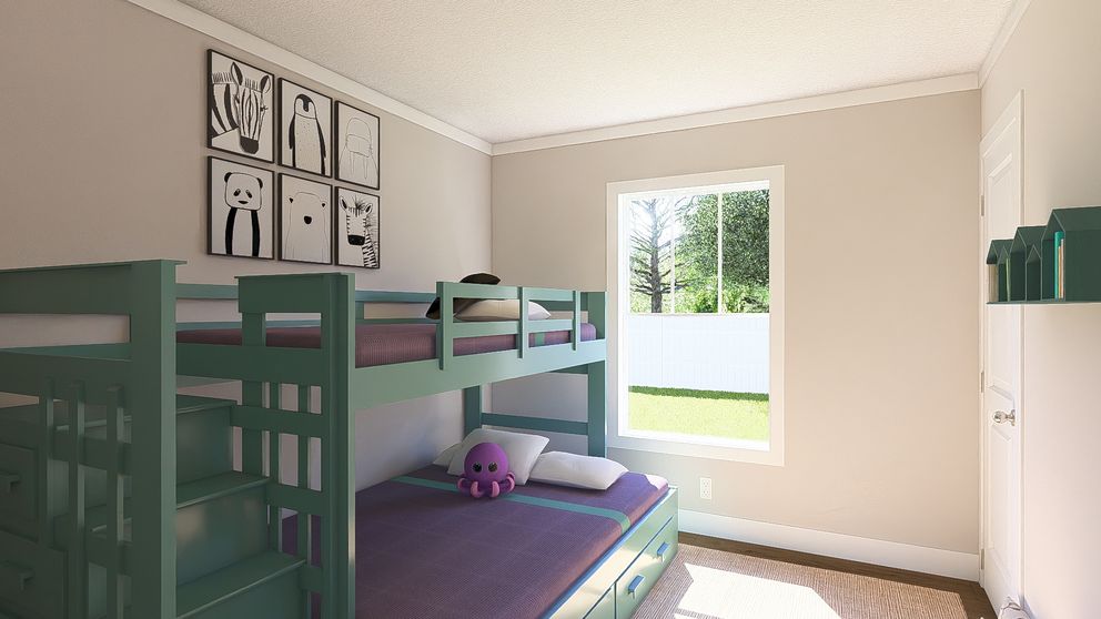 The MOVE ON UP Guest Bedroom. This Manufactured Mobile Home features 3 bedrooms and 2 baths.