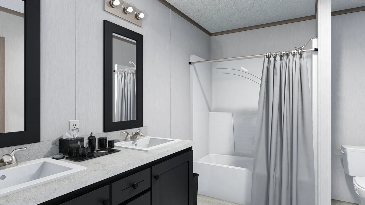 The 5224-E735 THE PULSE Primary Bathroom. This Manufactured Mobile Home features 3 bedrooms and 2 baths.