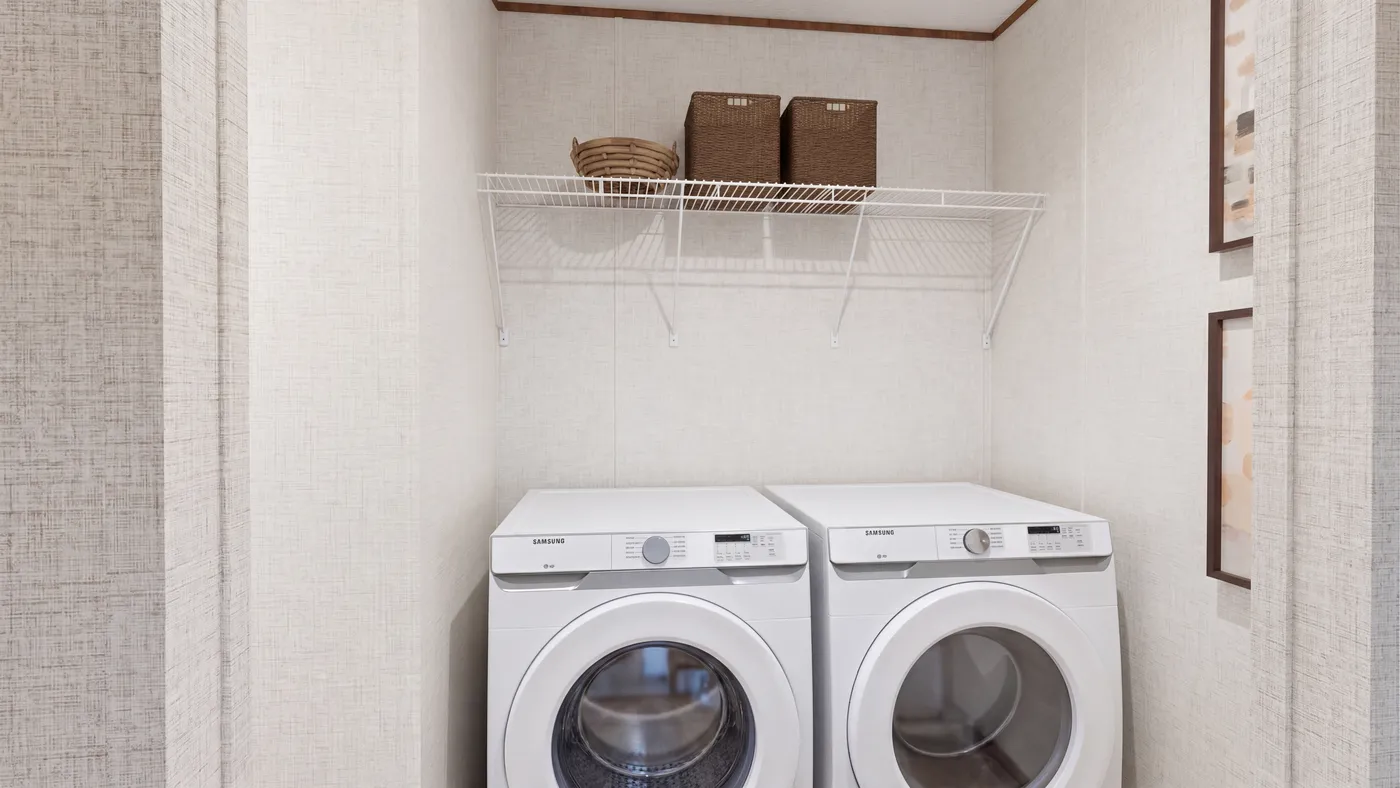 The SPRUCE Utility Room. This Manufactured Mobile Home features 3 bedrooms and 2 baths.