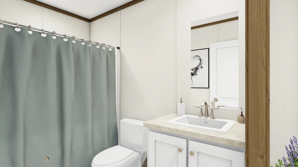 The GLIMPSE Guest Bathroom. This Manufactured Mobile Home features 3 bedrooms and 2 baths.