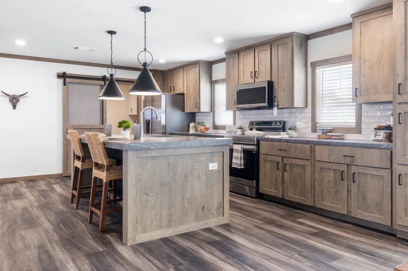 The ISABELLA ELITE Kitchen. This Manufactured Mobile Home features 3 bedrooms and 2 baths.