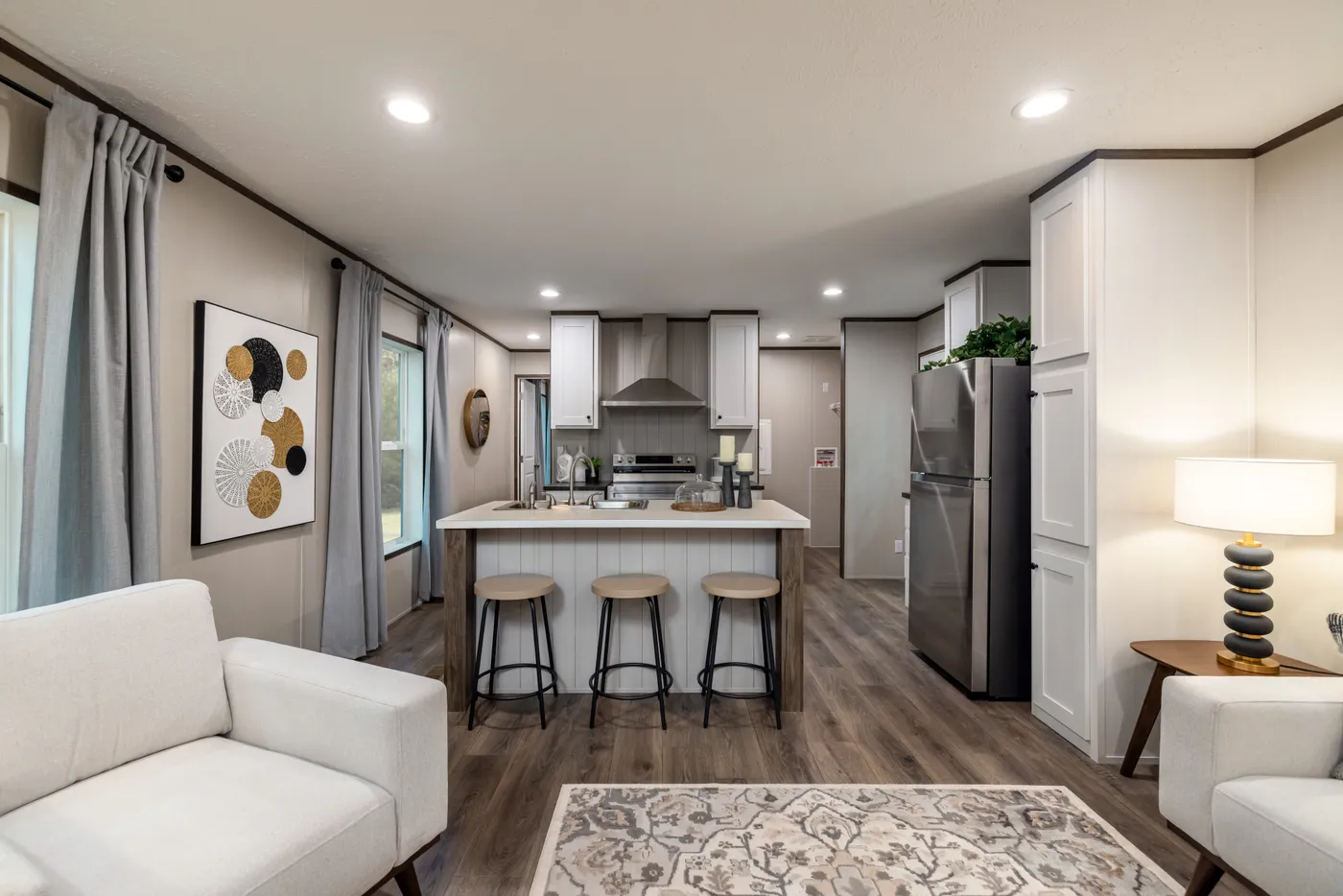 The INTUITION Family Room. This Manufactured Mobile Home features 3 bedrooms and 2 baths.