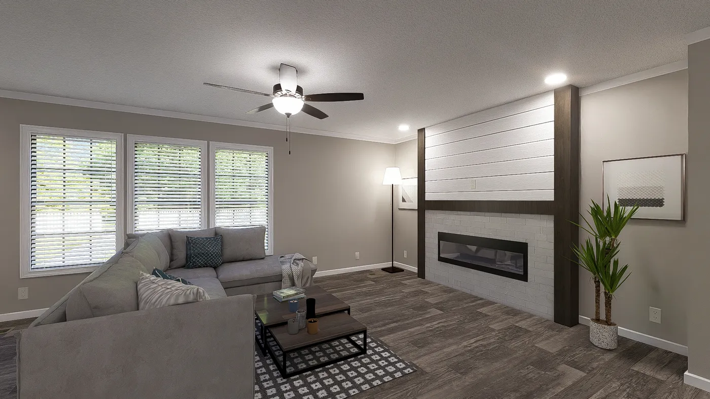 The THE LIL' EASY Living Room. This Manufactured Mobile Home features 3 bedrooms and 2 baths.