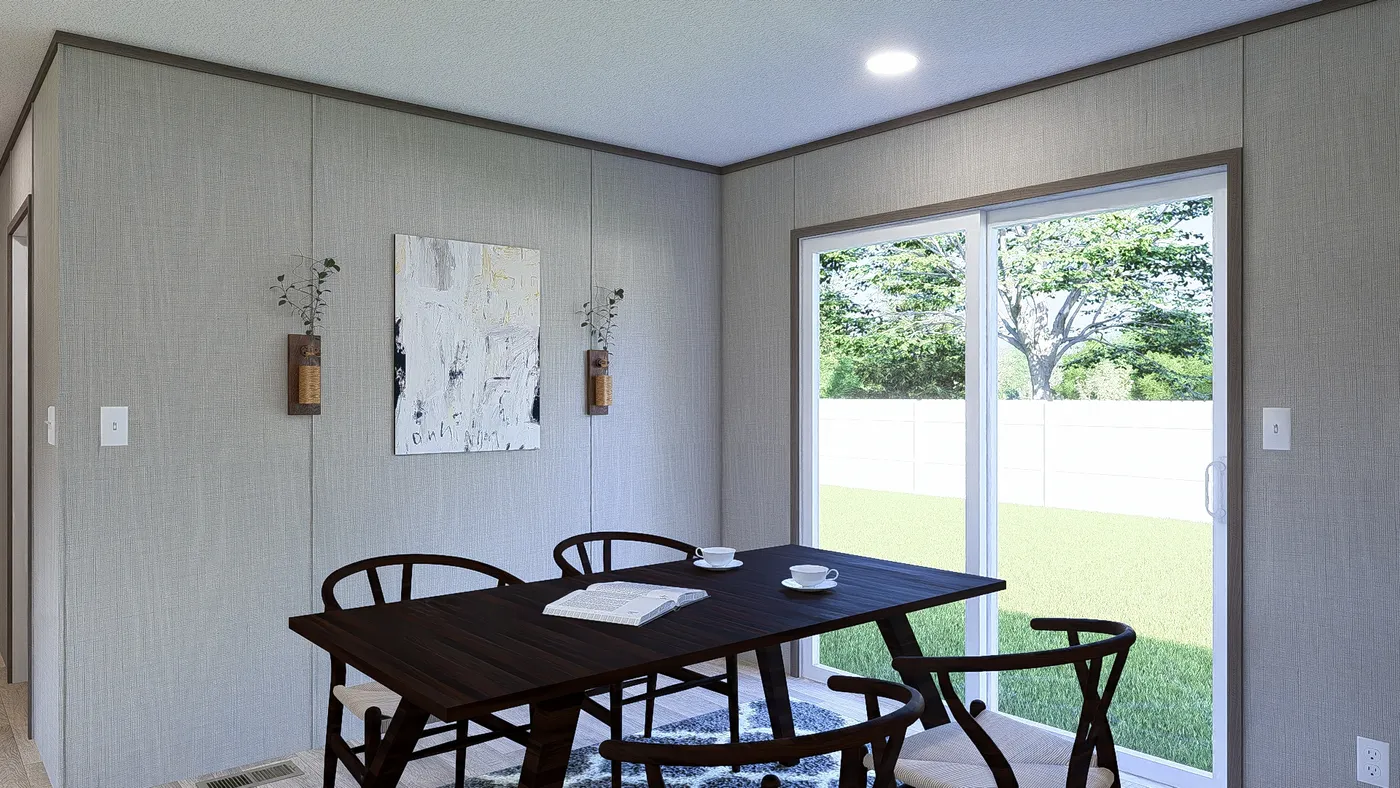 The ULTRA BREEZE 28X76 Dining Area. This Manufactured Mobile Home features 4 bedrooms and 2 baths.