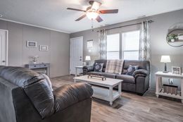 The TRADITION 48 Family Room. This Manufactured Mobile Home features 3 bedrooms and 2 baths.