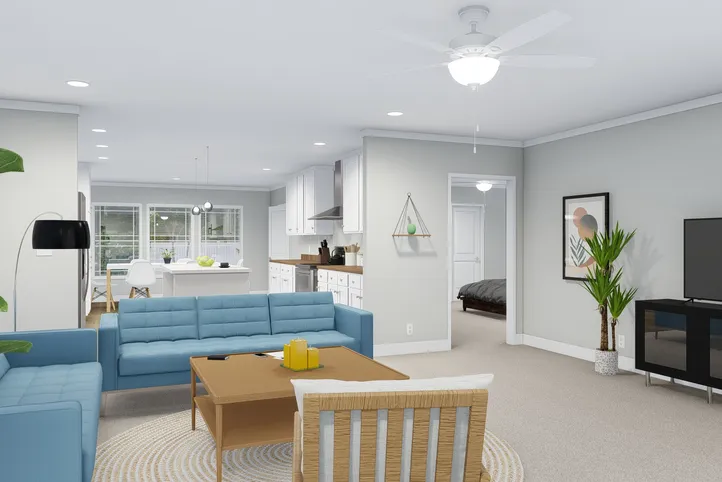 The REMINGTON Living Room. This Manufactured Mobile Home features 3 bedrooms and 2 baths.