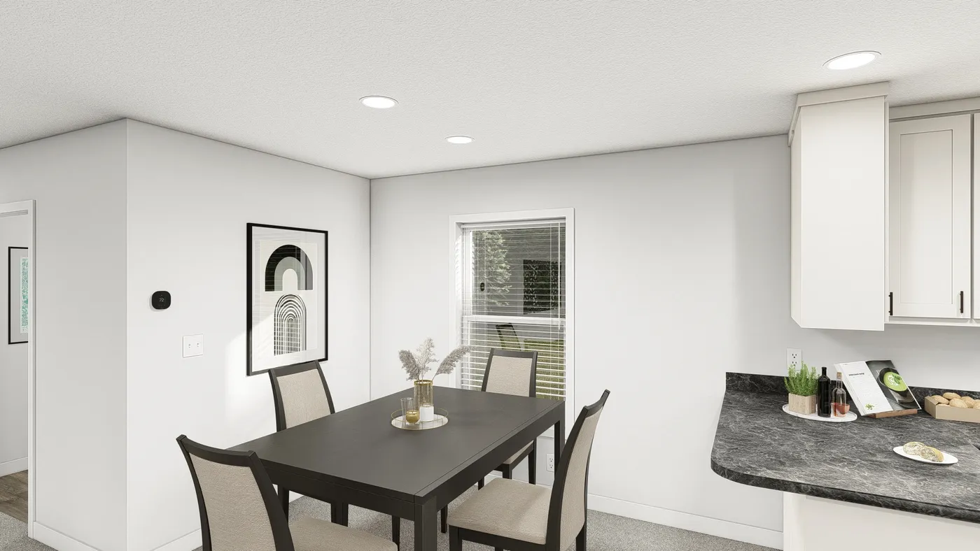 The DRM482P 2048'            DREAM Dining Area. This Manufactured Mobile Home features 2 bedrooms and 2 baths.