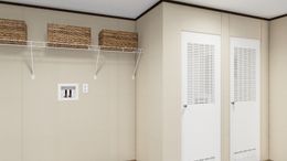 The PRIDE Utility Room. This Manufactured Mobile Home features 4 bedrooms and 2 baths.