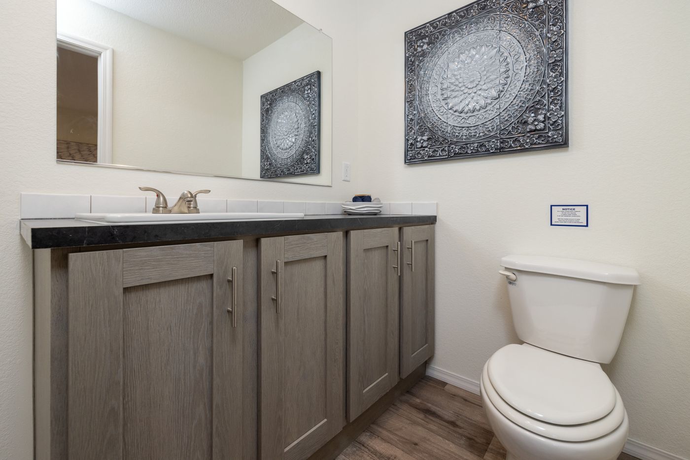 The RAMSEY 217-1 Guest Bathroom. This Manufactured Mobile Home features 3 bedrooms and 2 baths.