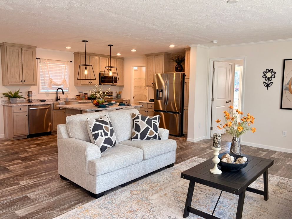 The TOURMALINE 7628-649 Living Room. This Manufactured Mobile Home features 4 bedrooms and 2 baths.