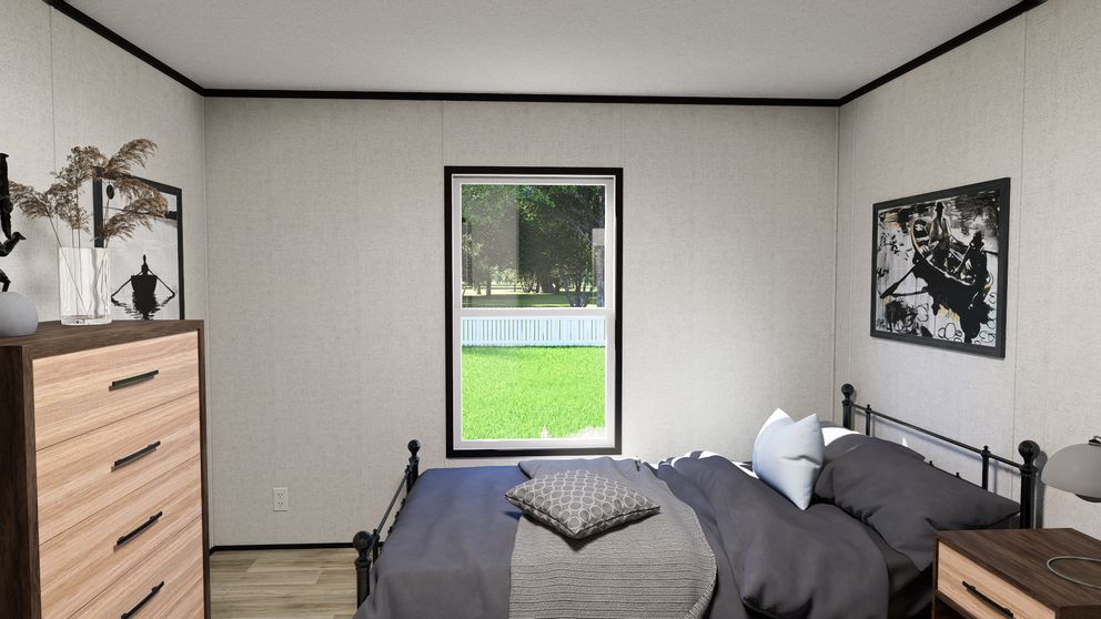 The SOLACE Guest Bedroom. This Manufactured Mobile Home features 4 bedrooms and 2 baths.