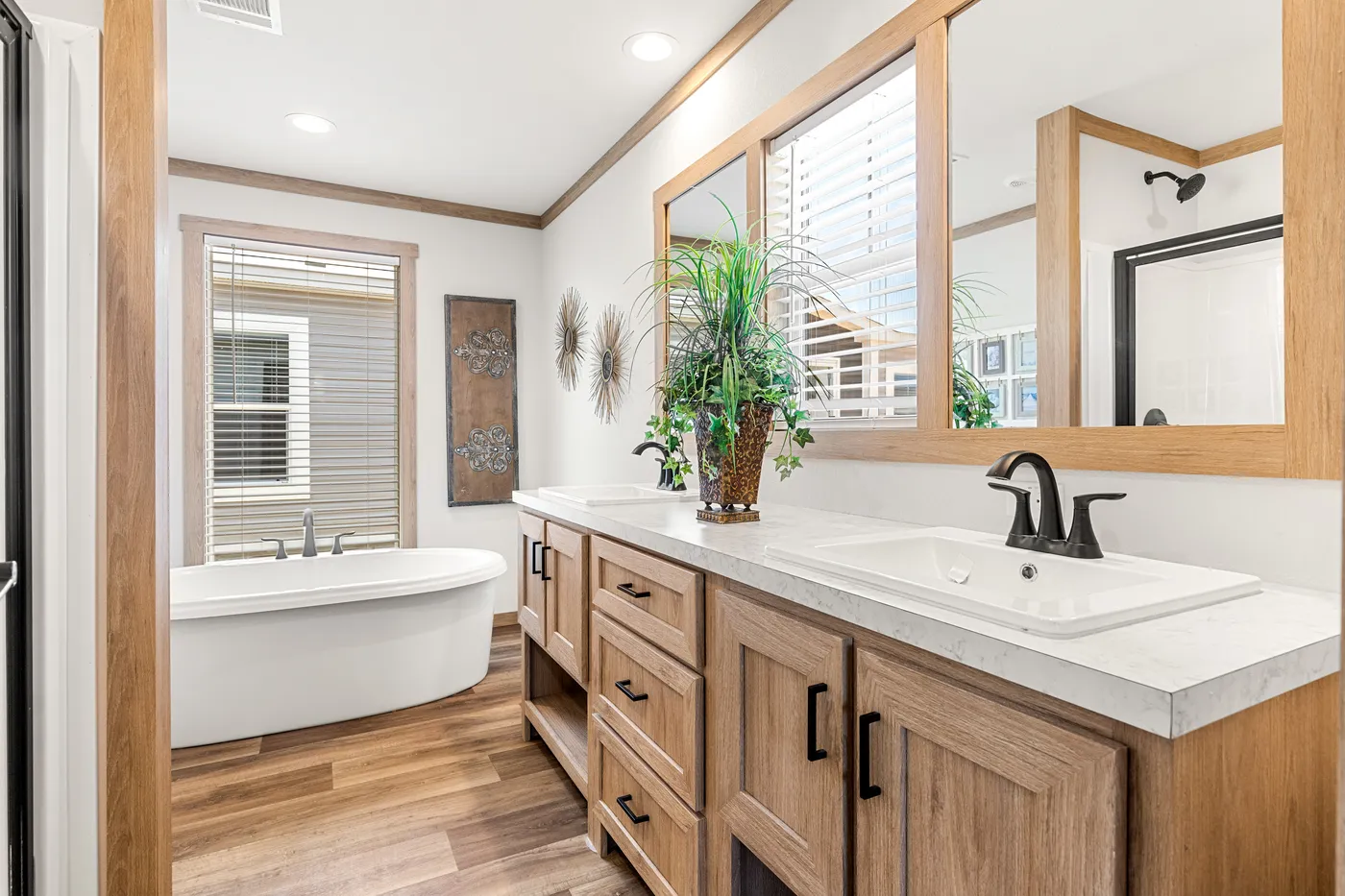 The LIZZIE Primary Bathroom. This Manufactured Mobile Home features 3 bedrooms and 2 baths.