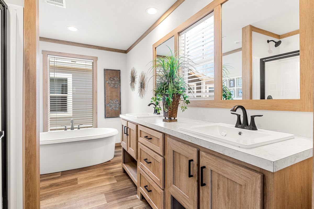 The LIZZIE Primary Bathroom. This Manufactured Mobile Home features 3 bedrooms and 2 baths.