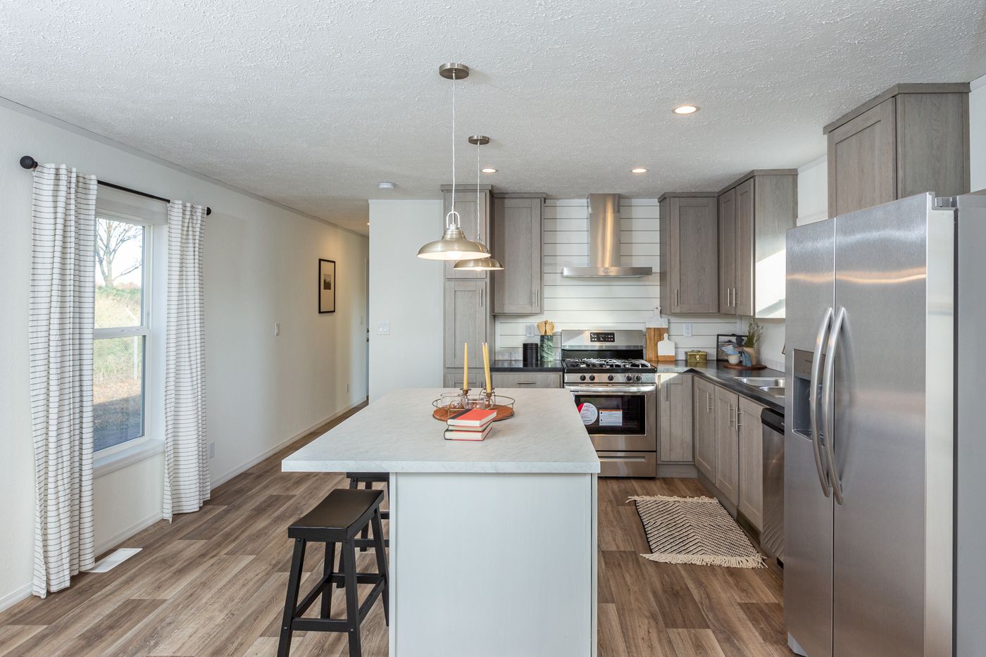 The LIFESTYLE 208 Kitchen. This Manufactured Mobile Home features 3 bedrooms and 2 baths.