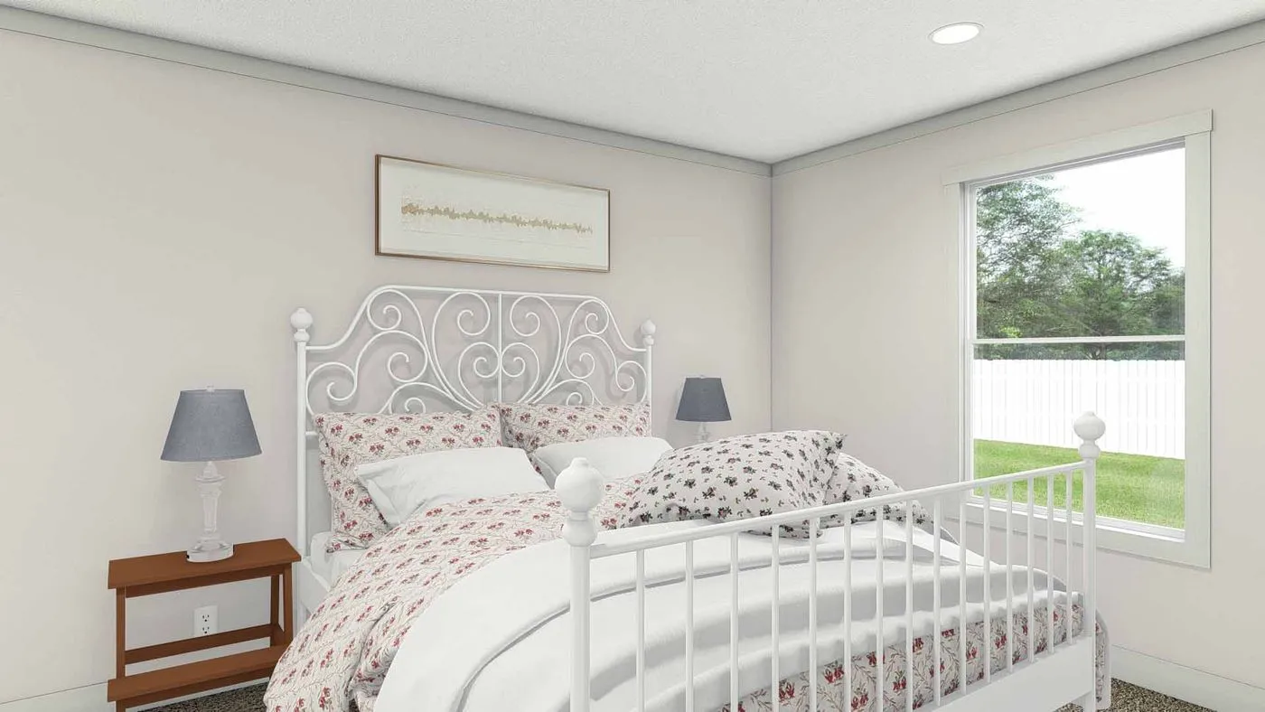 The BEAUTIFUL MORNING Bedroom. This Manufactured Mobile Home features 3 bedrooms and 2 baths.