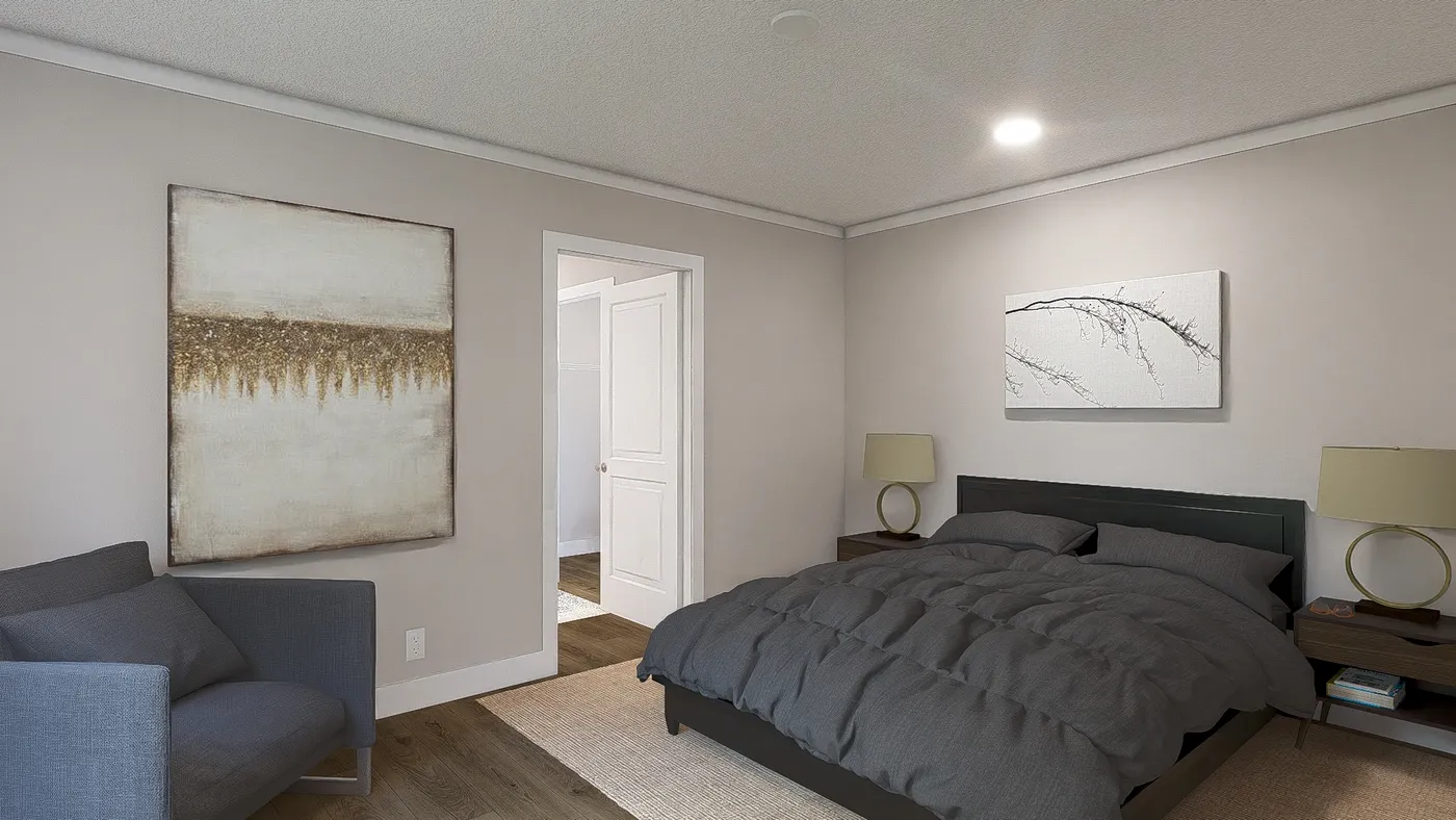 The SWEET CAROLINE Primary Bedroom. This Manufactured Mobile Home features 3 bedrooms and 2 baths.