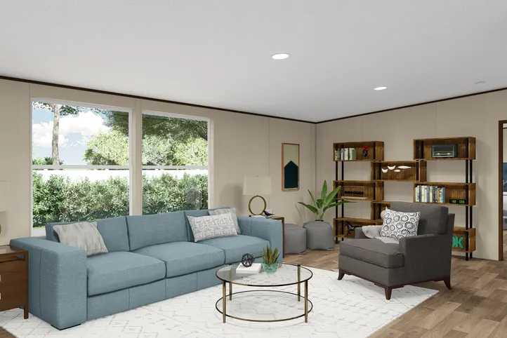 The THRILL Living Room. This Manufactured Mobile Home features 3 bedrooms and 2 baths.