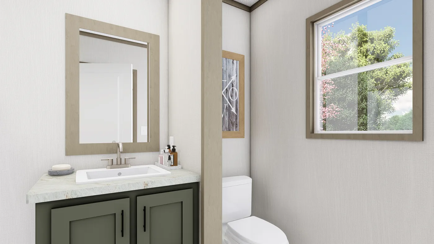 The LEWIS Guest Bathroom. This Manufactured Mobile Home features 2 bedrooms and 2 baths.