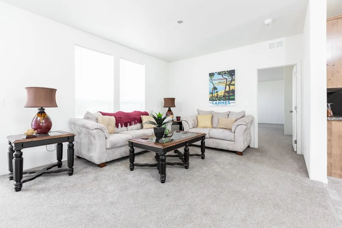The 2025 COLUMBIA RIVER (NEW) Living Room. This Manufactured Mobile Home features 4 bedrooms and 2 baths.