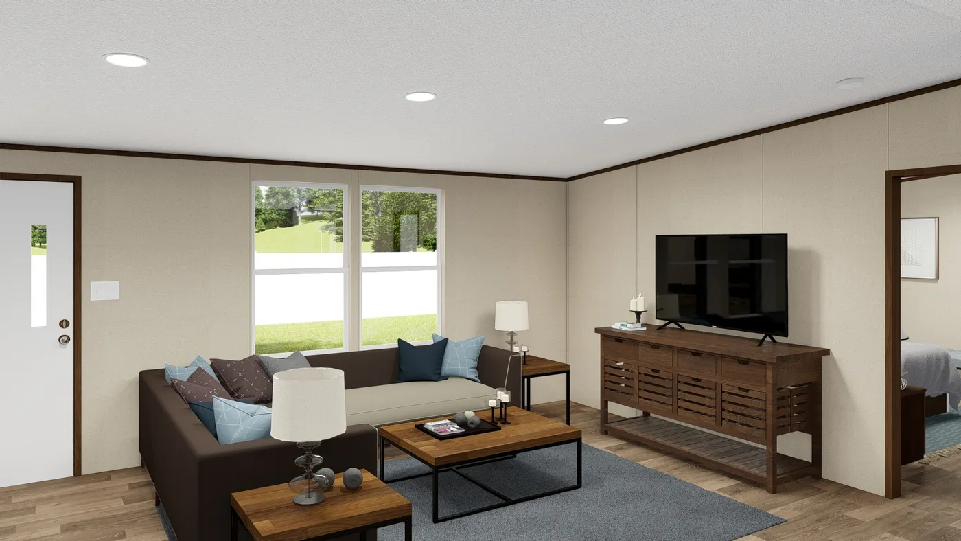 The EXCITEMENT Living Room. This Manufactured Mobile Home features 3 bedrooms and 2 baths.