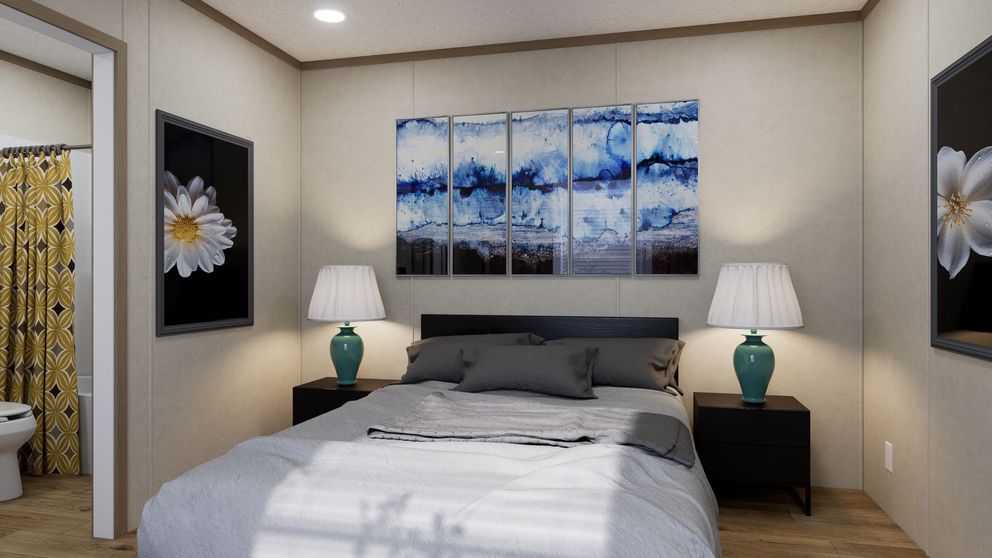 The 6014-CC02 CLEARPATH 60 Primary Bedroom. This Manufactured Mobile Home features 2 bedrooms and 2 baths.
