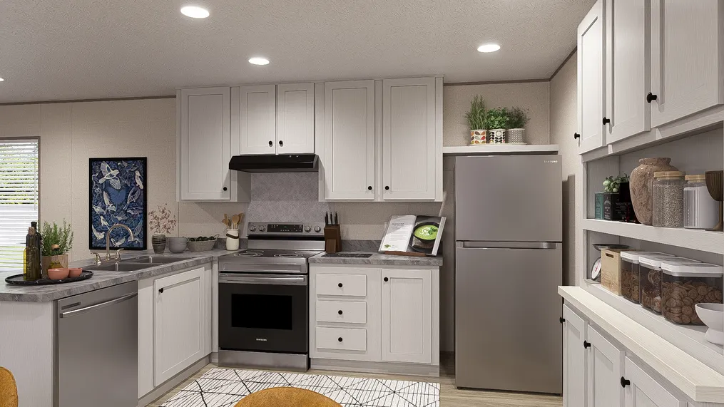 The BLAZER 76 4A Kitchen. This Manufactured Mobile Home features 4 bedrooms and 2 baths.
