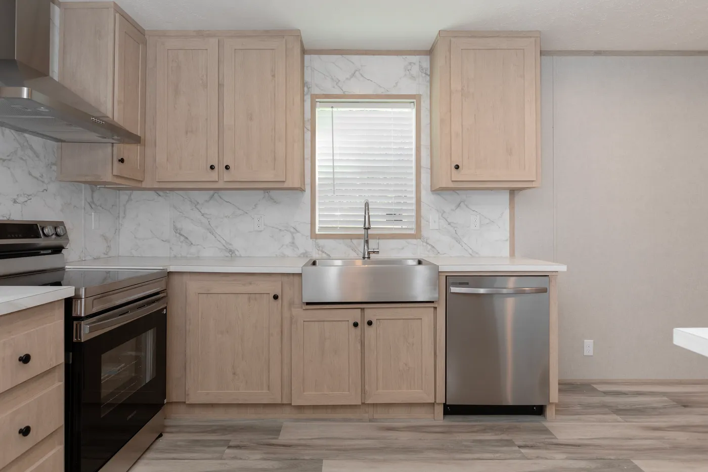 The THE THUNDERHEAD Kitchen. This Manufactured Mobile Home features 3 bedrooms and 2 baths.