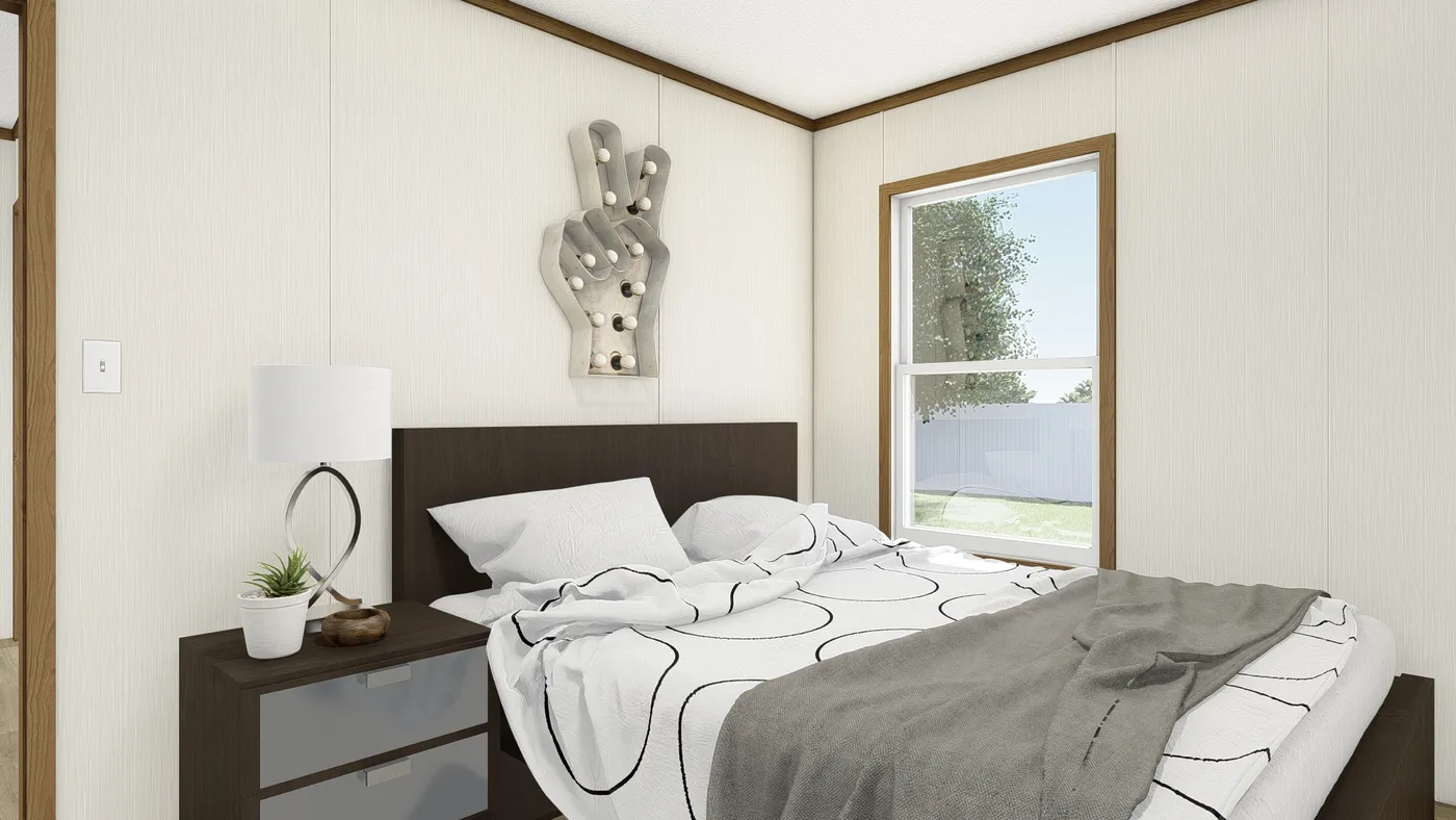 The IMPACT Guest Bedroom. This Manufactured Mobile Home features 4 bedrooms and 2 baths.