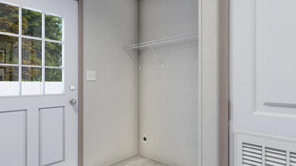 The 6616-4791 THE PULSE Utility Room. This Manufactured Mobile Home features 3 bedrooms and 2 baths.