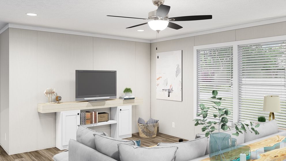 The THE FUSION 32H Living Room. This Manufactured Mobile Home features 5 bedrooms and 3 baths.